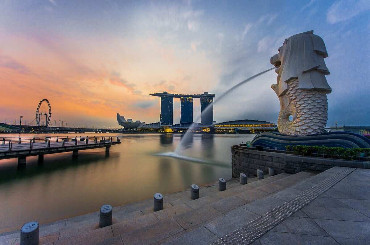 Rear view of the Merlion statue at Merlion Park Singapore with Marina Bay Sands in the distance