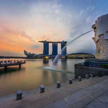 Rear view of the Merlion statue at Merlion Park Singapore with Marina Bay Sands in the distance